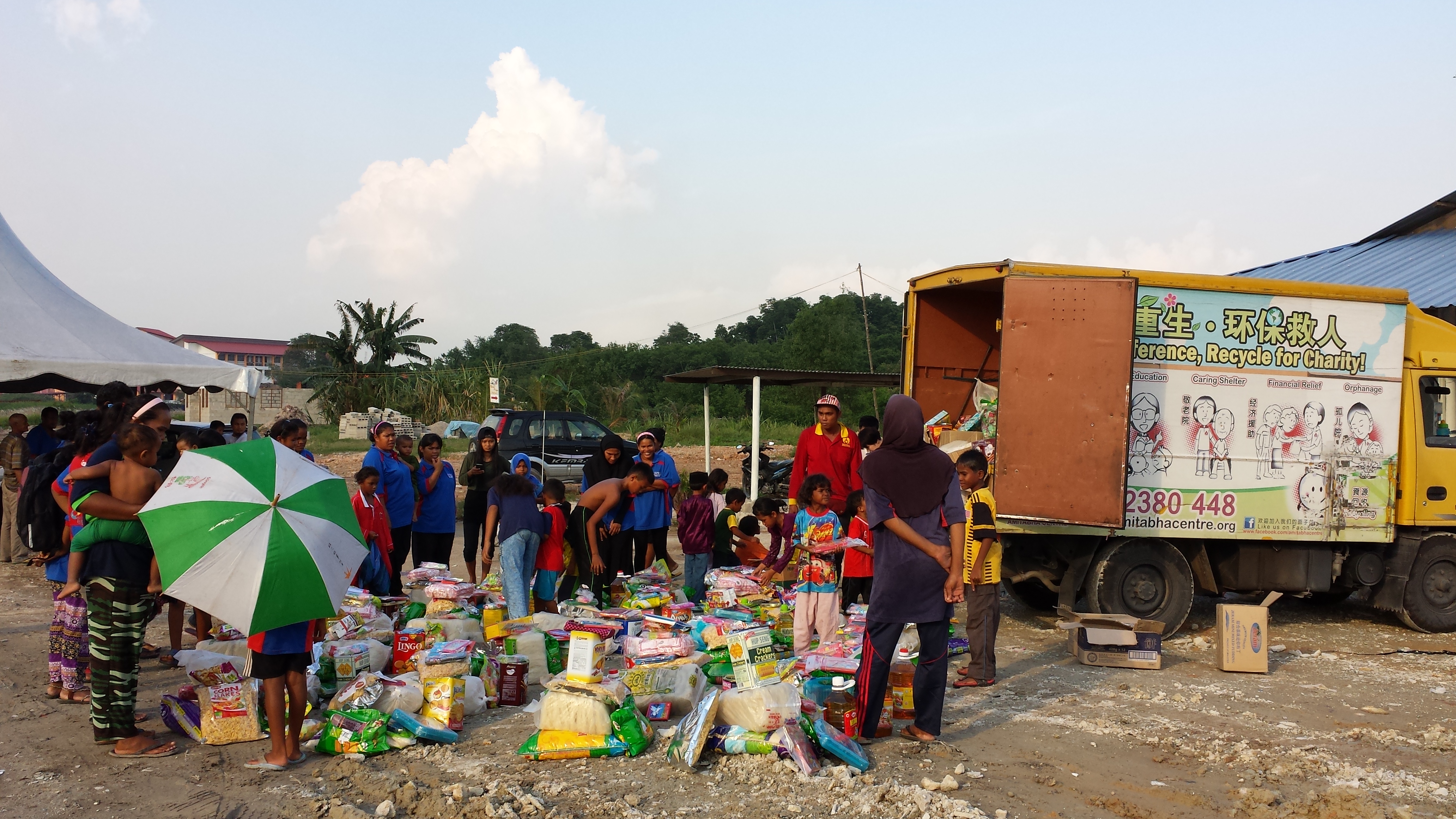 Yellow Bin disaster relief textile recycling campaign — recycle clothes donation Malaysia